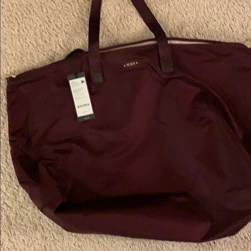 Tumi carry on tote